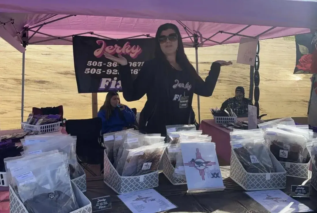 Bags of Jerky Fixx jerky lined up at the booth